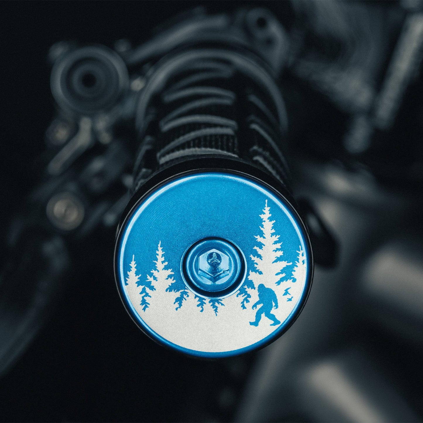 Bigfoot Hiding - blue bicycle bar end plugs durable and fun Sasquatch design perfect for road or mtb setups.