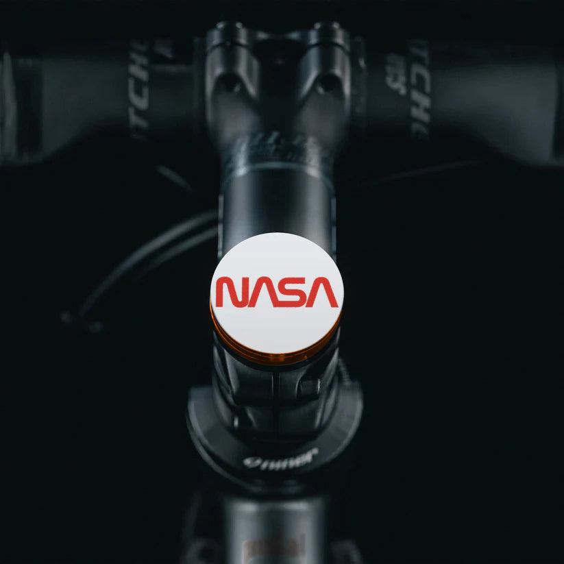 Brown Shapeshifter headset cap displaying the NASA worm logo