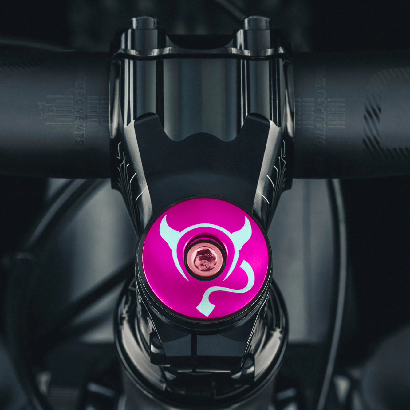 Hot pink bike top cap crafted from durable 6061 aluminum perfect for custom bicycle accessories.