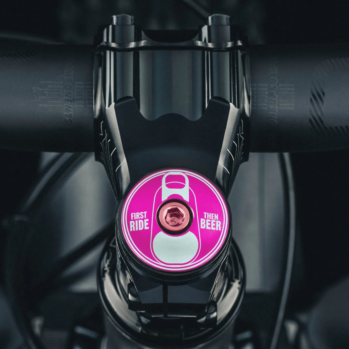Hot pink bike headset top cover with "First Ride Then Beer" design