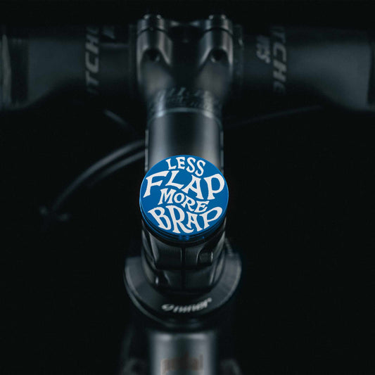 Less Flap More Brap - Shapeshifter Bicycle Headset Cap featuring a flat top and no center hole for a clean and unique design.