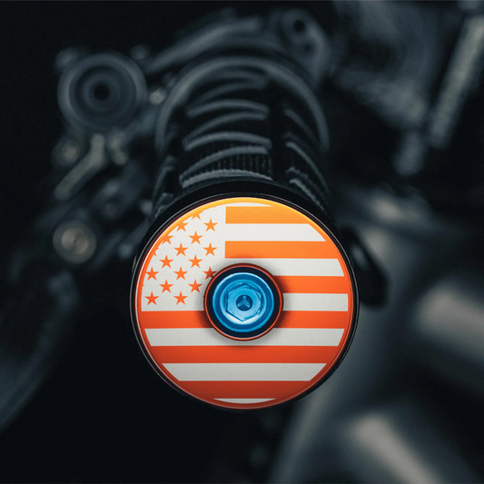 Orange bike bar end plugs with American flag are great for upgrades.