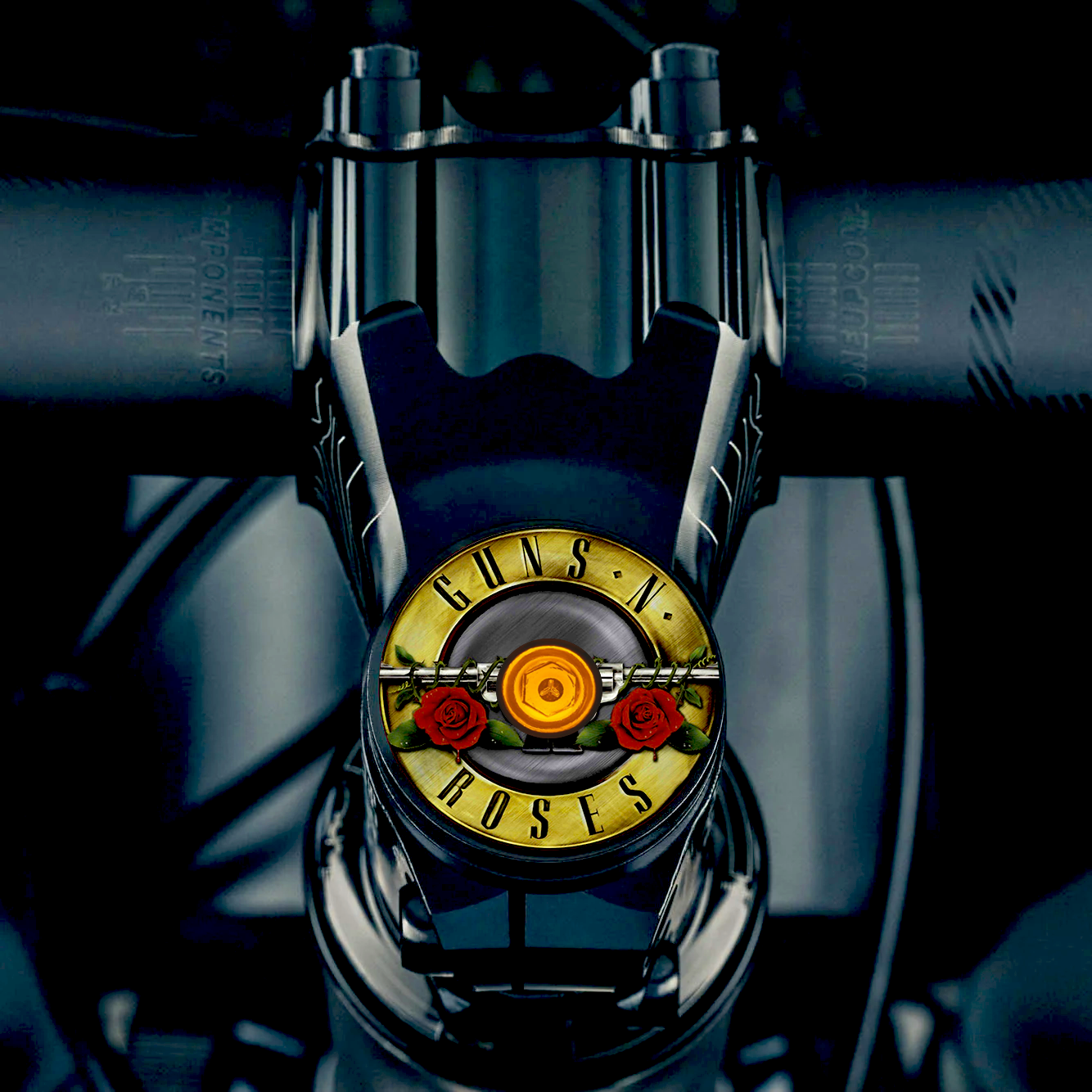 Orange bike headset top cover crafted from lightweight aluminum.