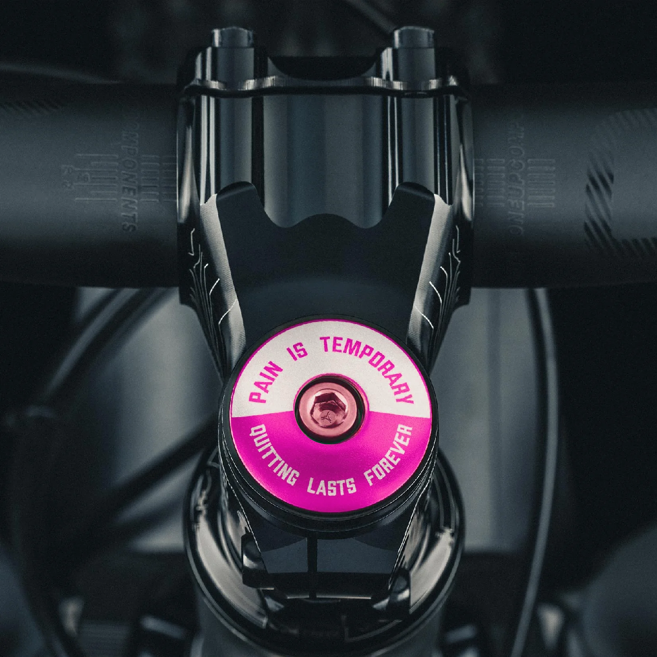 Hot pink bike headset cap for custom bicycle accessories.