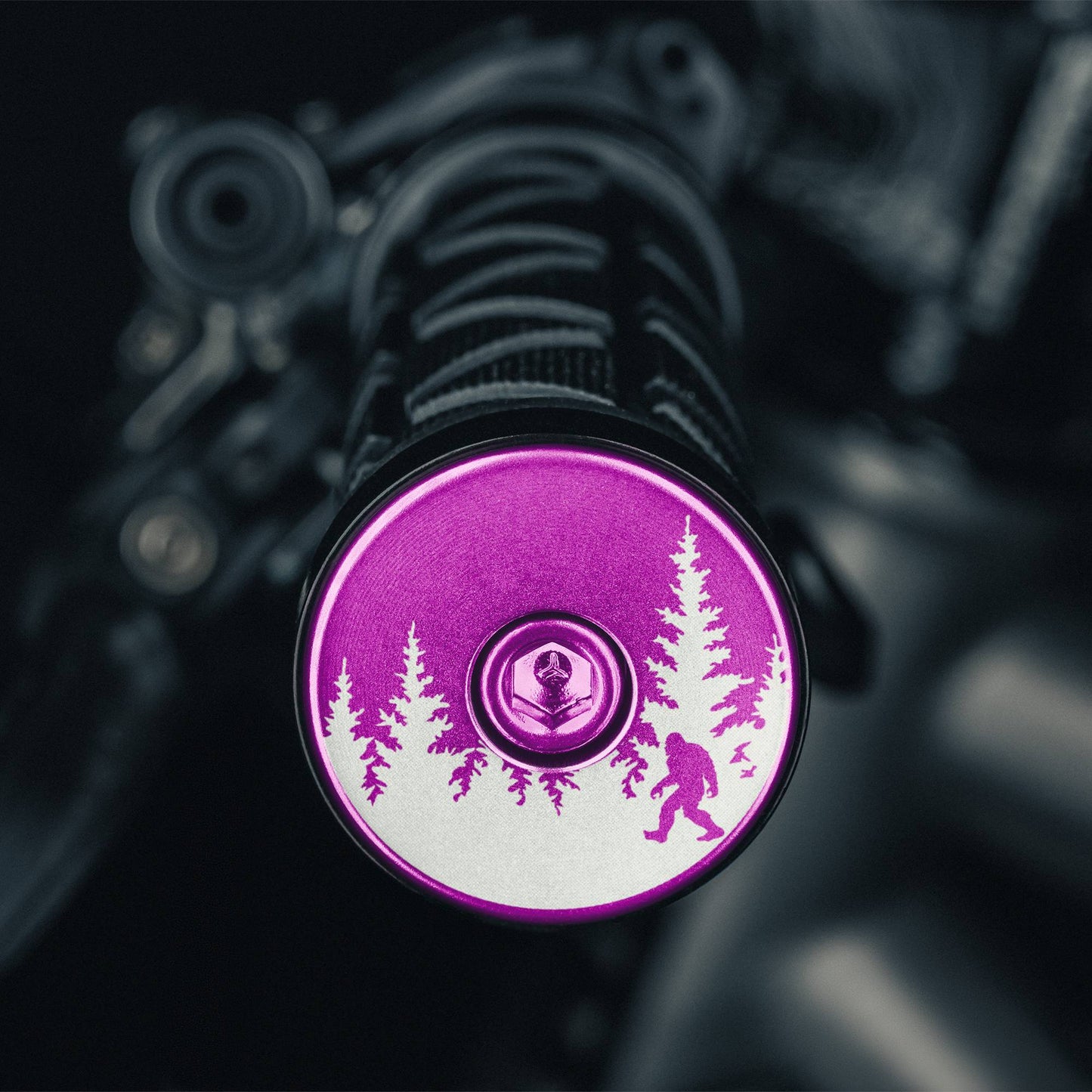 Bigfoot Hiding - Purple Sasquatch bike bar end plugs stylish and durable handlebar accessories for road or mtb setups.
