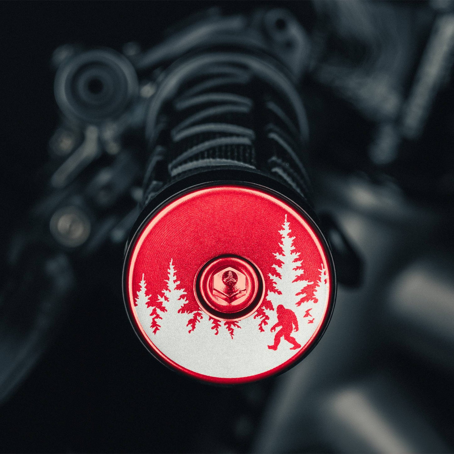 Bigfoot Hiding - Red bicycle bar end plugs with Sasquatch design durable option for road or mountain bike handlebars.