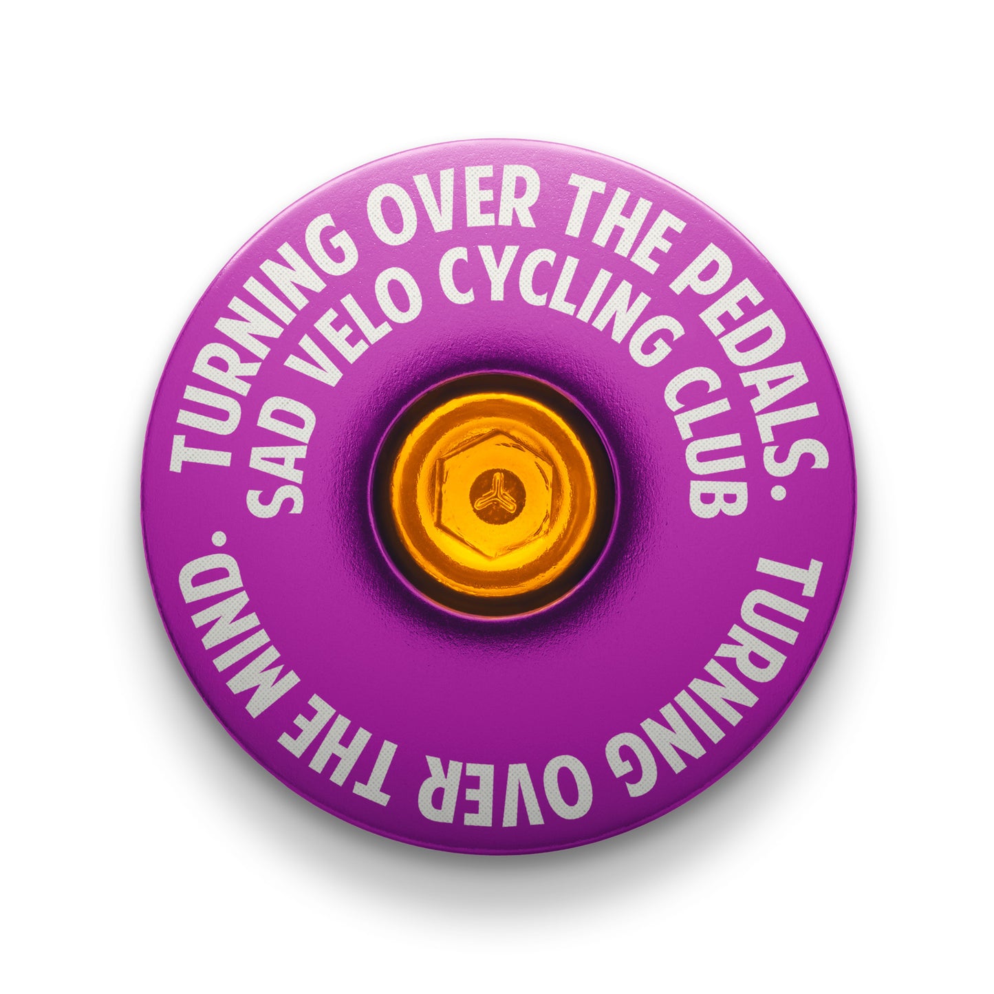 Purple headset cap for bicycles, made from durable aluminum and fits 1 1/8" steerer tubes.