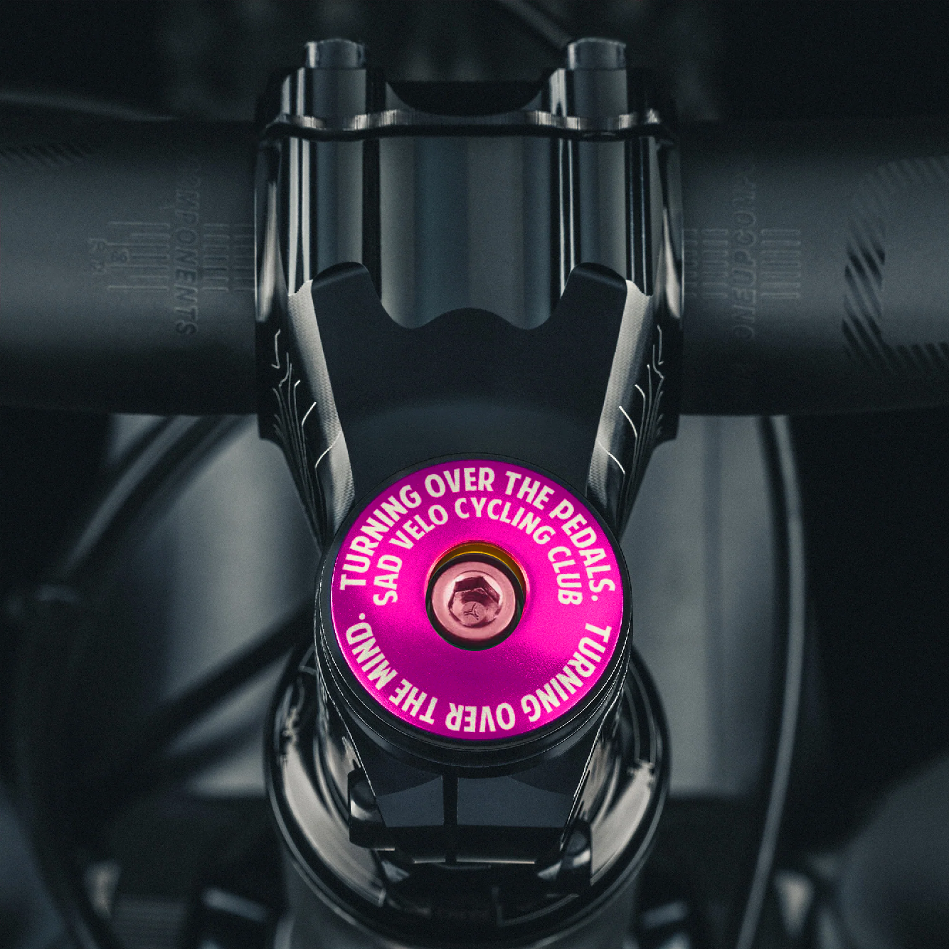 Hot pink bike headset cap for adding color and style to your mountain or road bike setup.