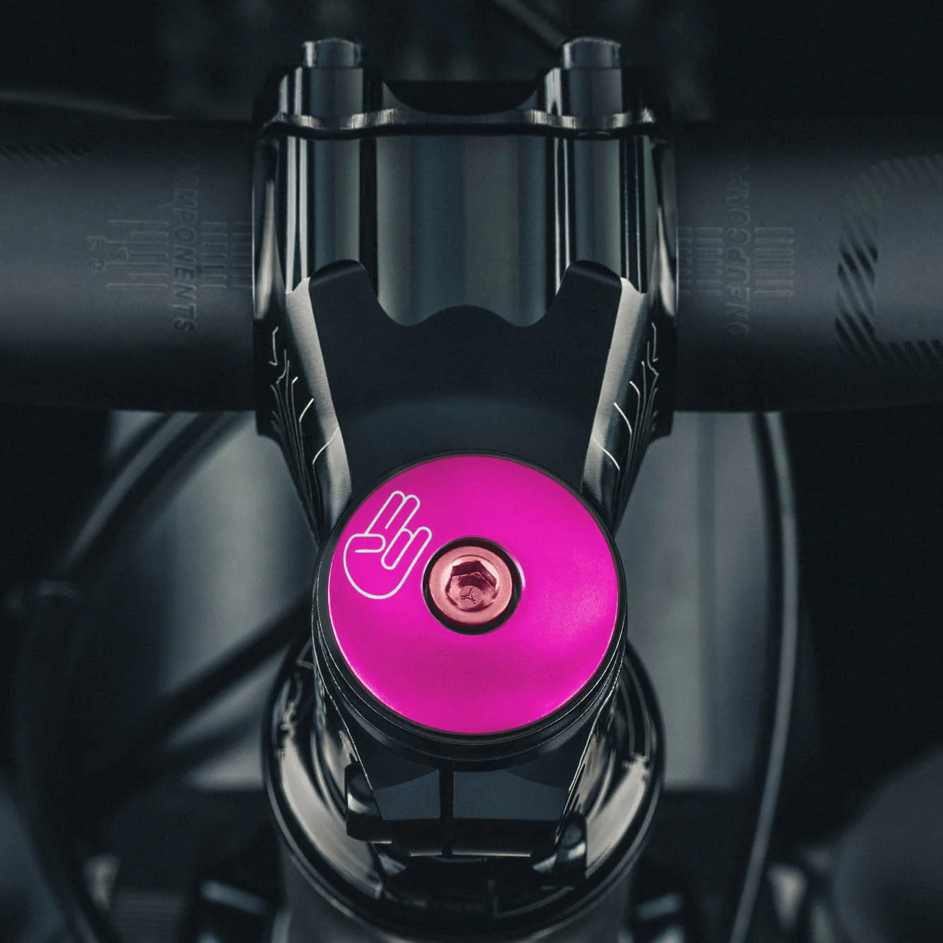Hot pink bike stem cap crafted from lightweight aluminum perfect for stylish and safe rides.