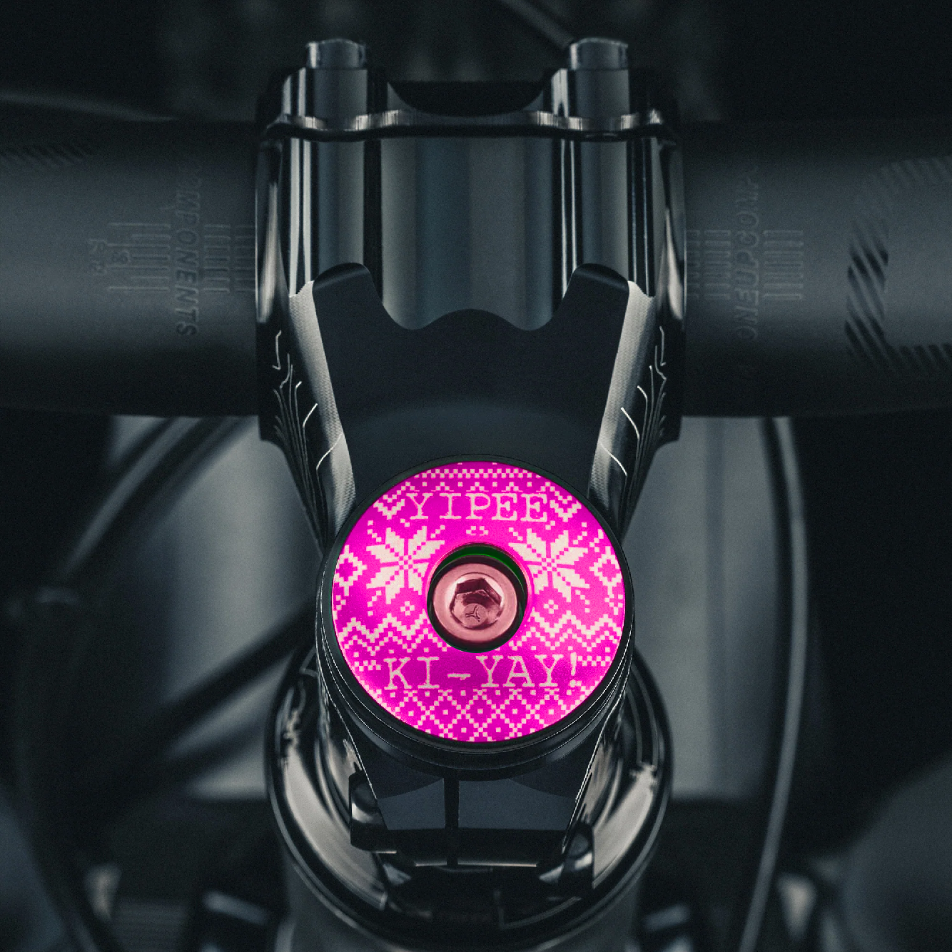Hot pink cycling top cap for personalized bicycle upgrades.