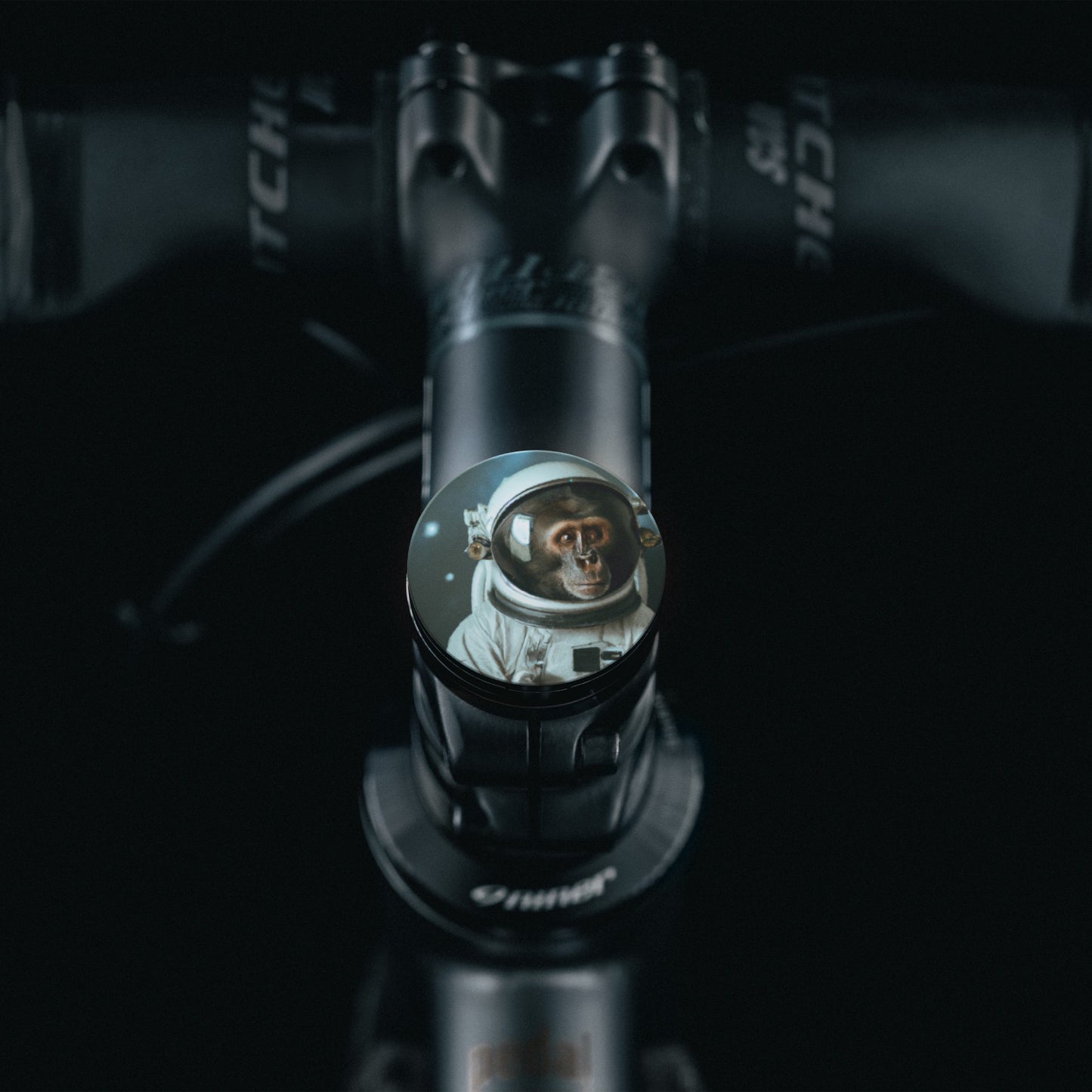 Sleek black bicycle headset cap with flat top design for modern bikes.