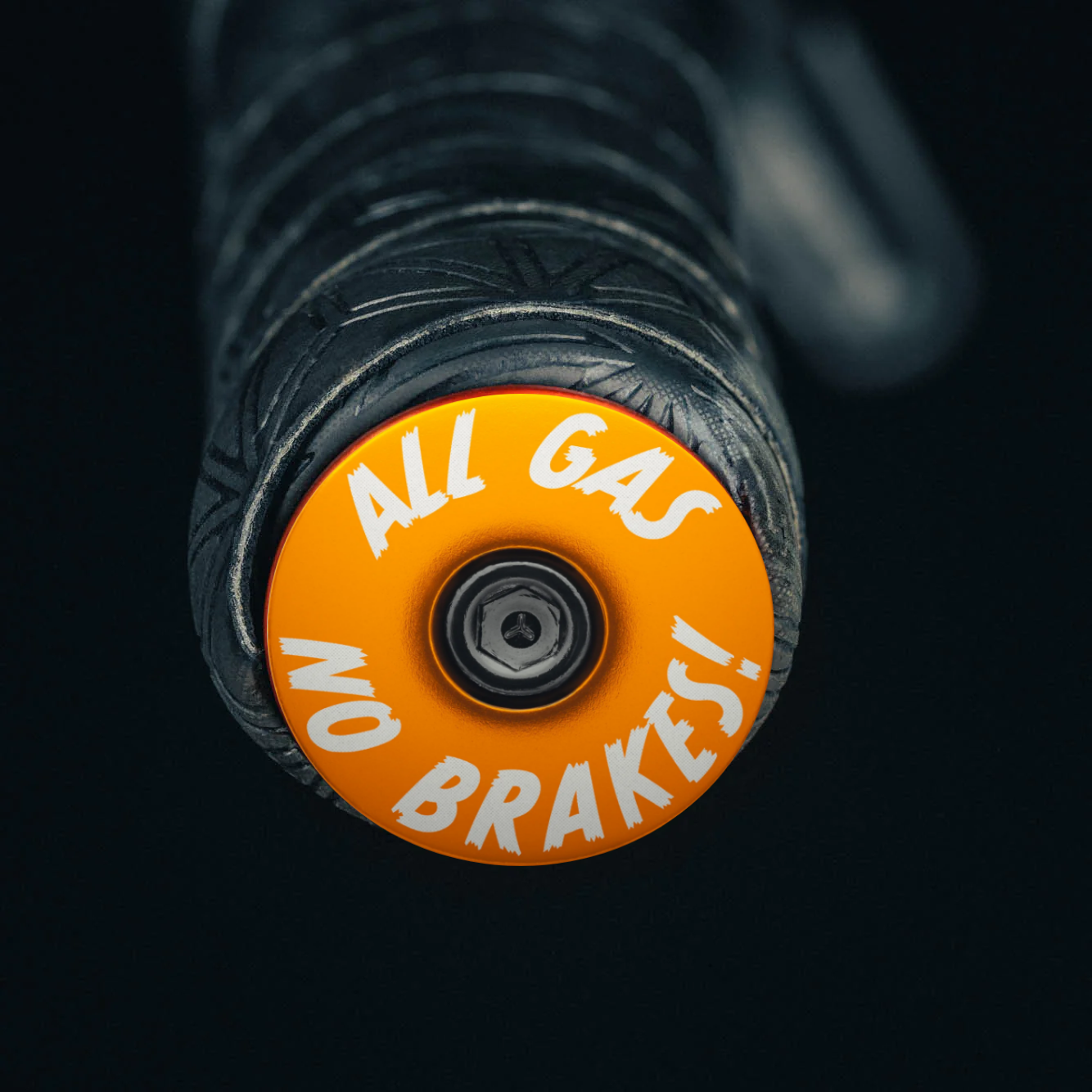 Orange mtb bar end plugs offering a custom touch for handlebars