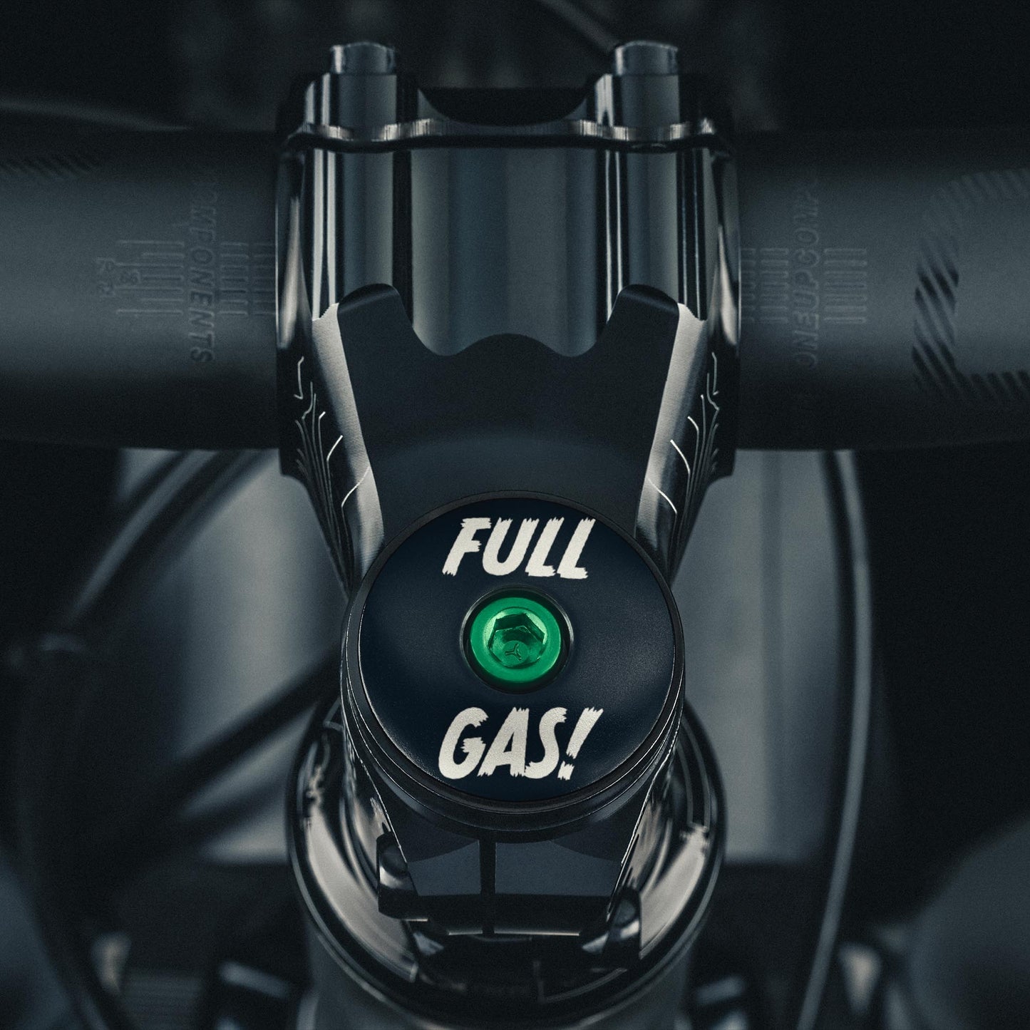 Black bicycle headset cap designed for 1 1/8" steerer tubes made from durable aluminum.