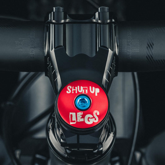 Shut Up Legs! Custom Bicycle Headset Cap with Shut Up Legs design fits 1 1/8-inch steerer tubes ideal for bike upgrades.