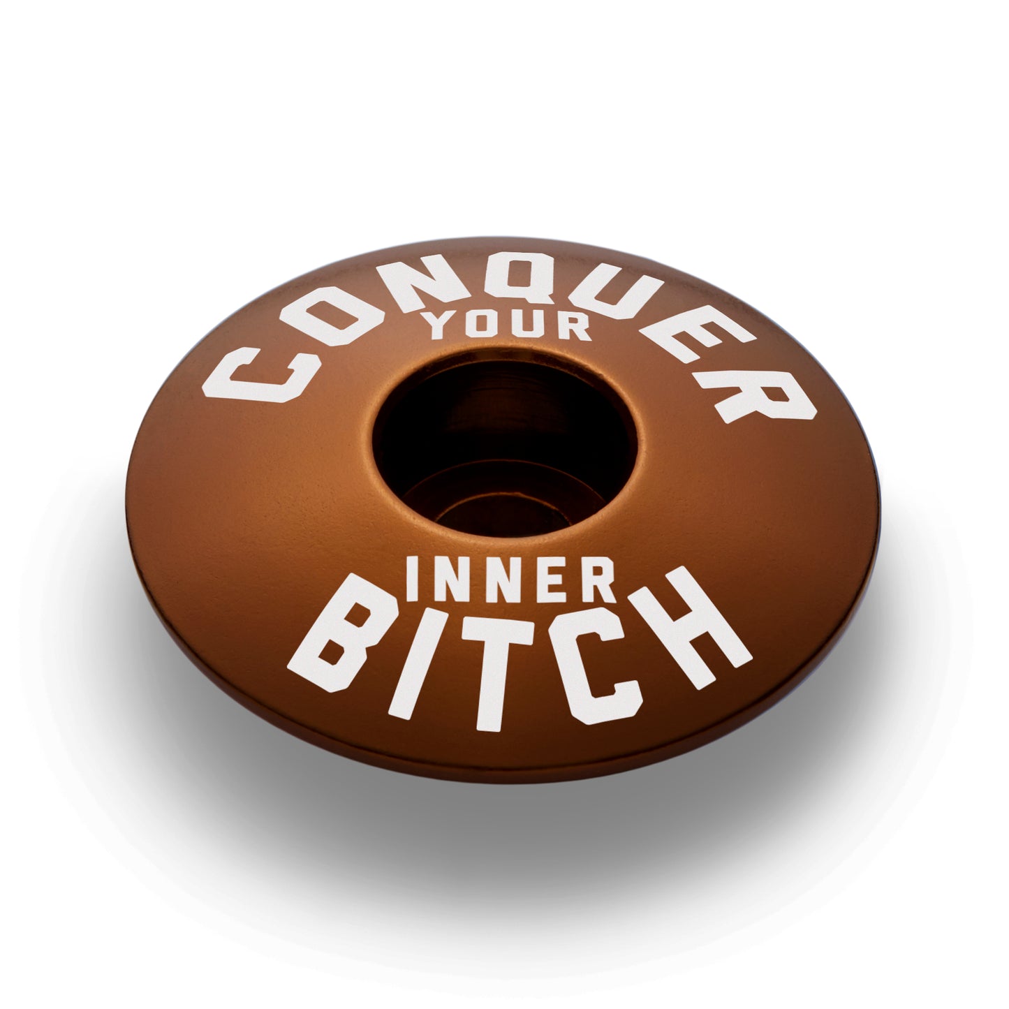 Elegant brown headset top cap for cyclists who appreciate custom bicycle accessories with subtle tones.