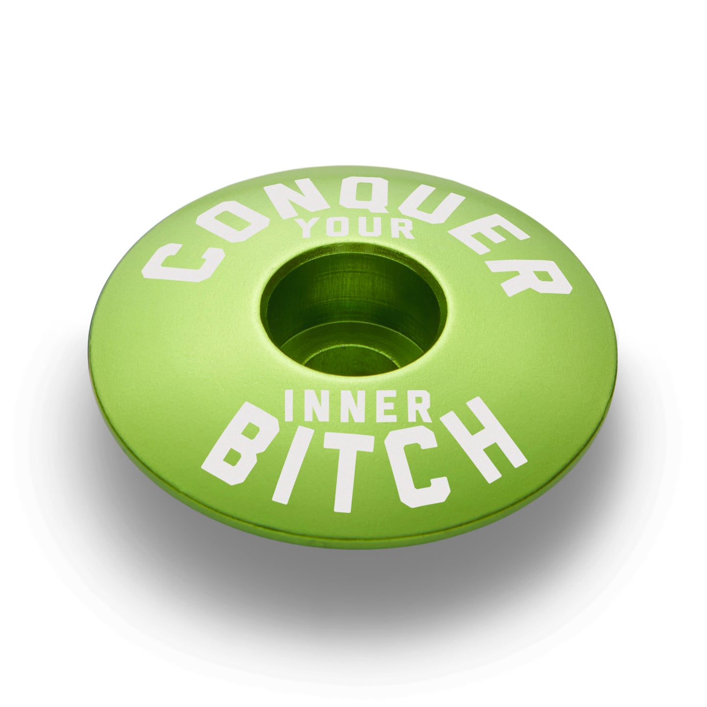 Lime green cycling top cap adding a bold pop of color to road bikes and mountain bikes.