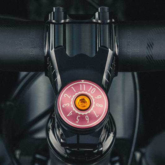 Pink bike stem cap for 1 1/8" steerer tube offering a custom look for your bicycle headset cap.