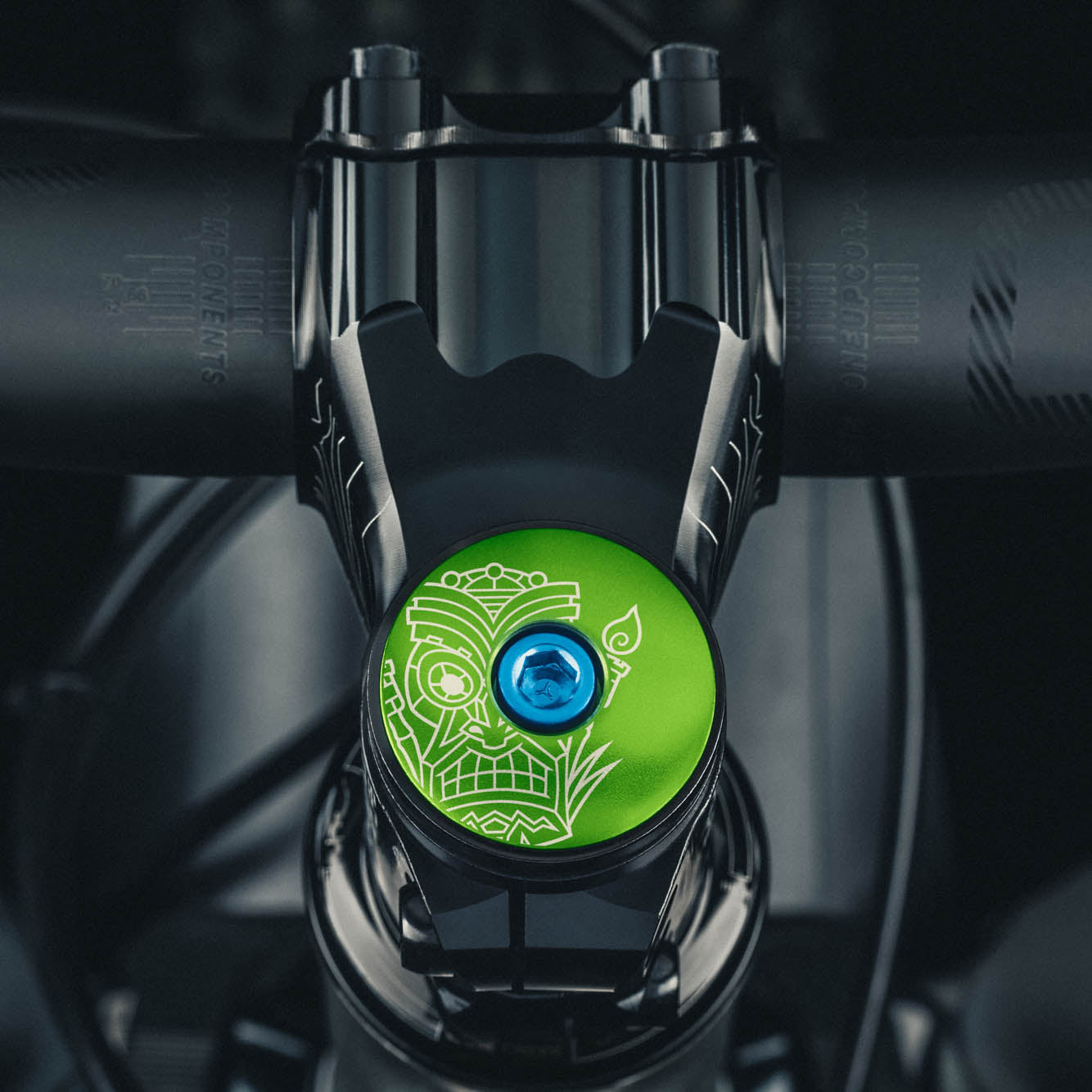 Tiki Trails Bicycle Headset Cap with a tiki-inspired design for 1 1/8-inch steerer tubes made of lightweight aluminum.