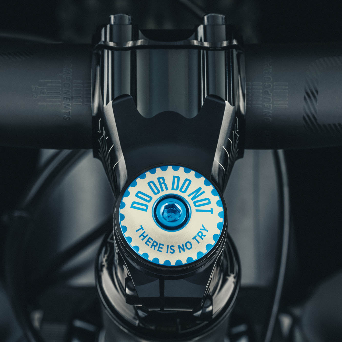 Do Or Do Not Blue stem cap designed for reliable bike components.