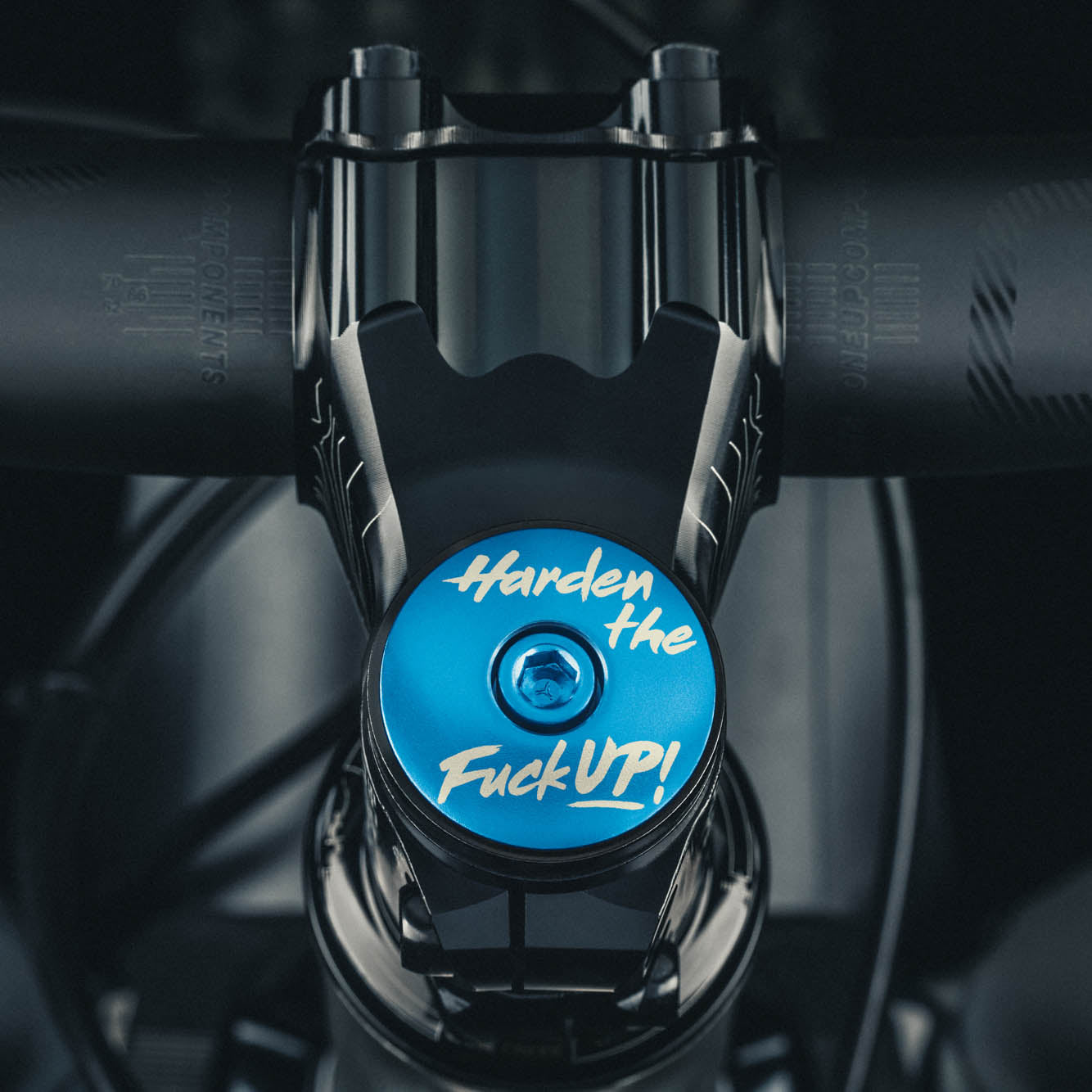 HTFU Bicycle Headset Cap is designed for a 1 1/8-inch steerer tube made from durable aluminum.