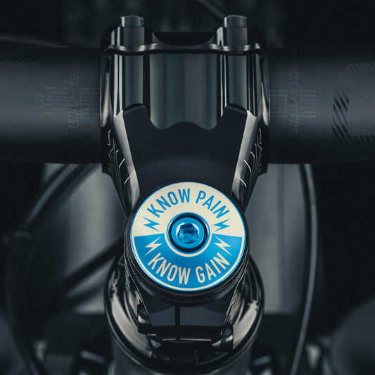 Know Pain, Know Gain Bicycle Headset Cap - a symbol of resilience for serious cyclists.