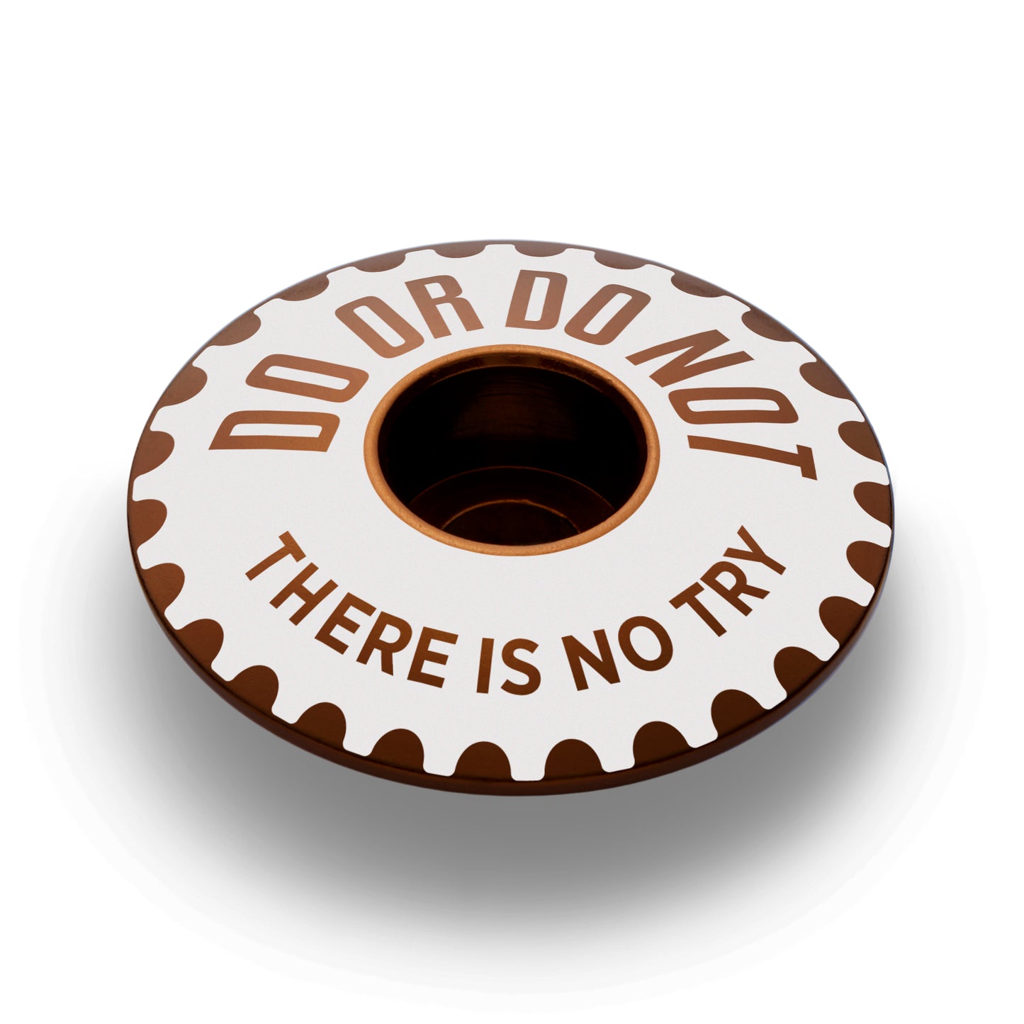 Brown bicycle headset cap designed for durability and style.