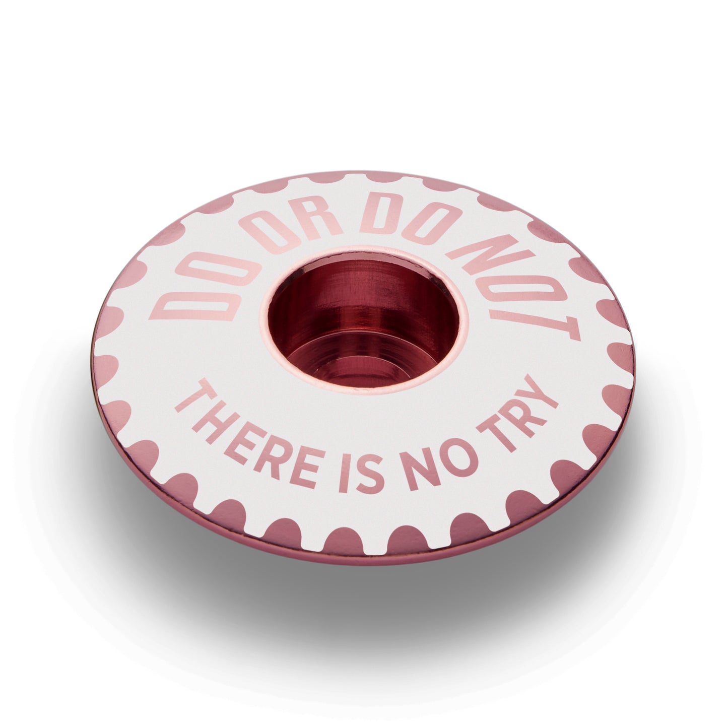 Pink stem topcap for adding a unique touch to your bike equipment.