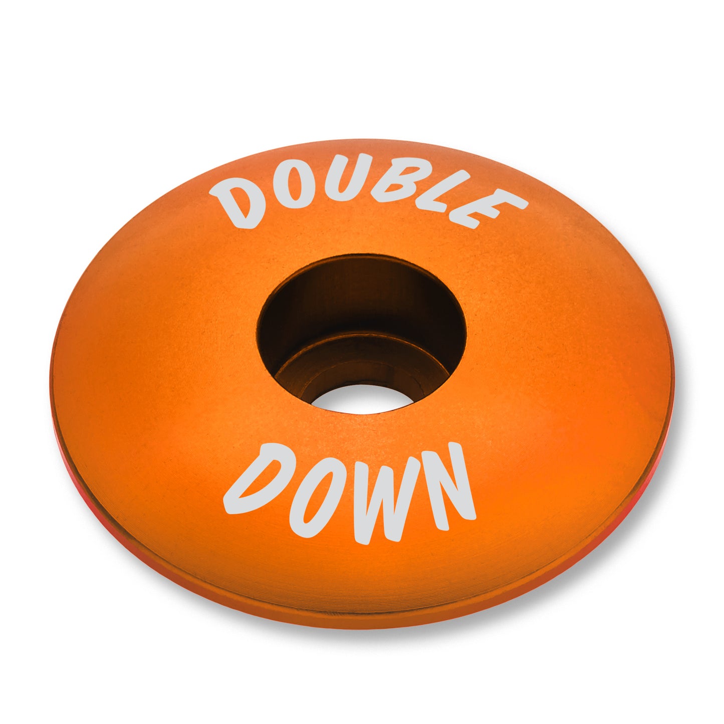Orange bicycle stem cap for a vibrant and durable bike component.
