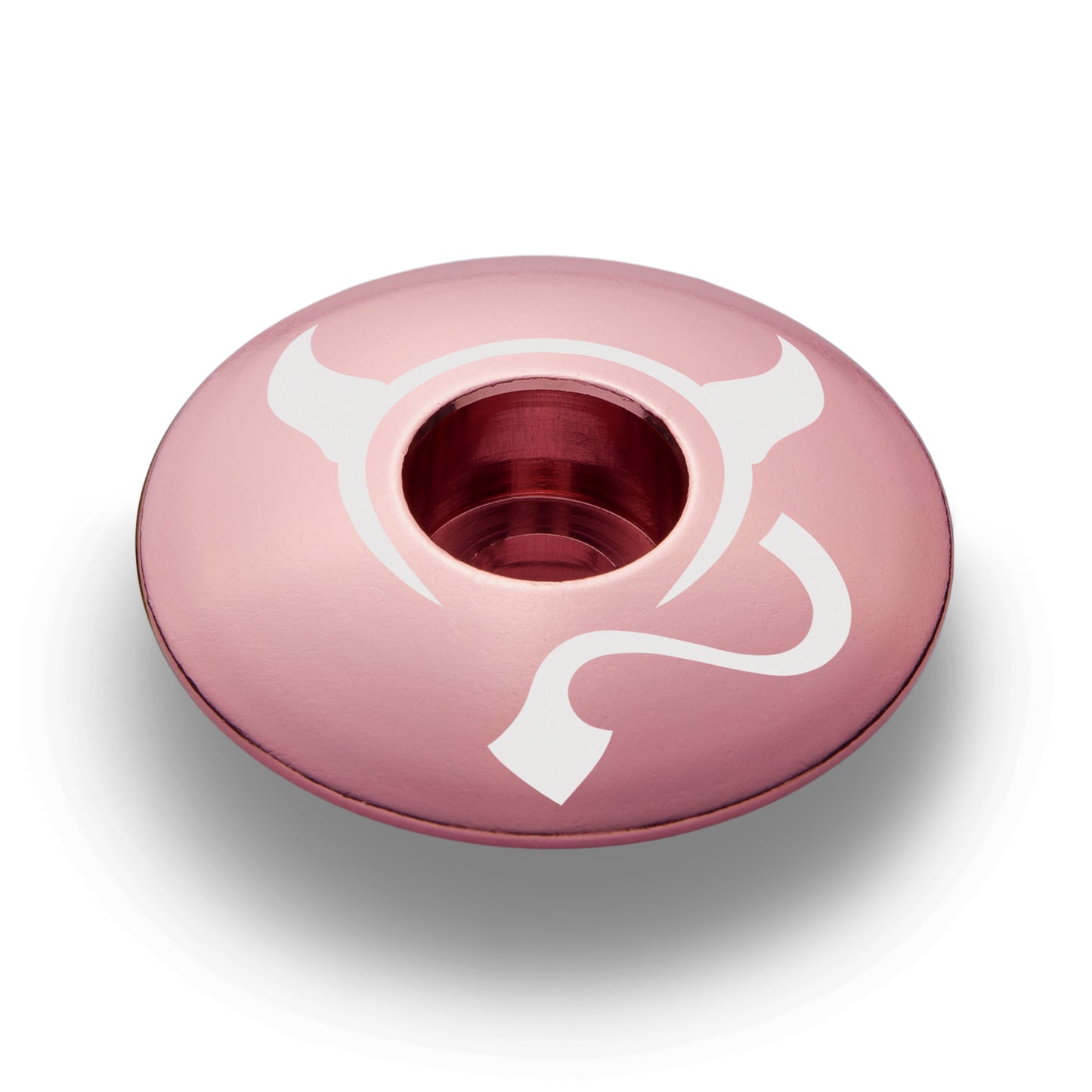 Pink bike stem cap made from lightweight 6061 aluminum perfect for custom bicycle accessories.