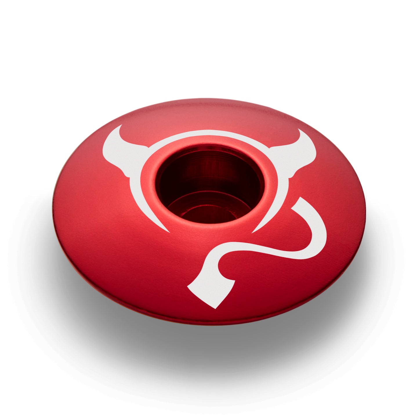 Red bike headset cap for mountain bikes with a lightweight and strong 6061 aluminum design.