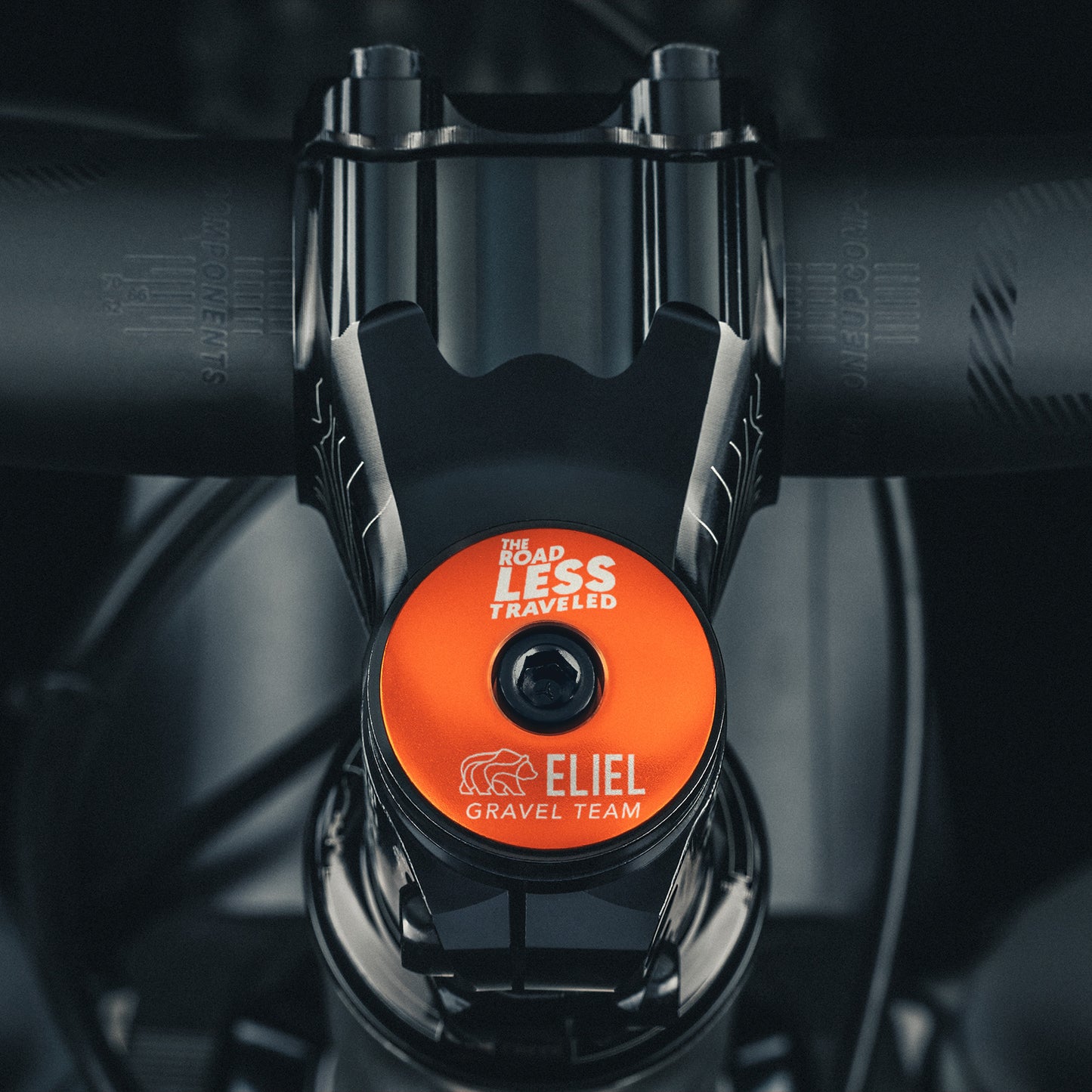 Orange bike headset top cover that brings a bright and functional addition to your bike.
