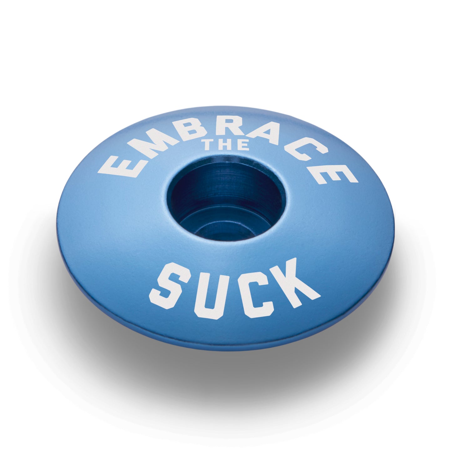 Blue bicycle headset cap that fits 1 1/8" steerer tubes for a custom bike component.