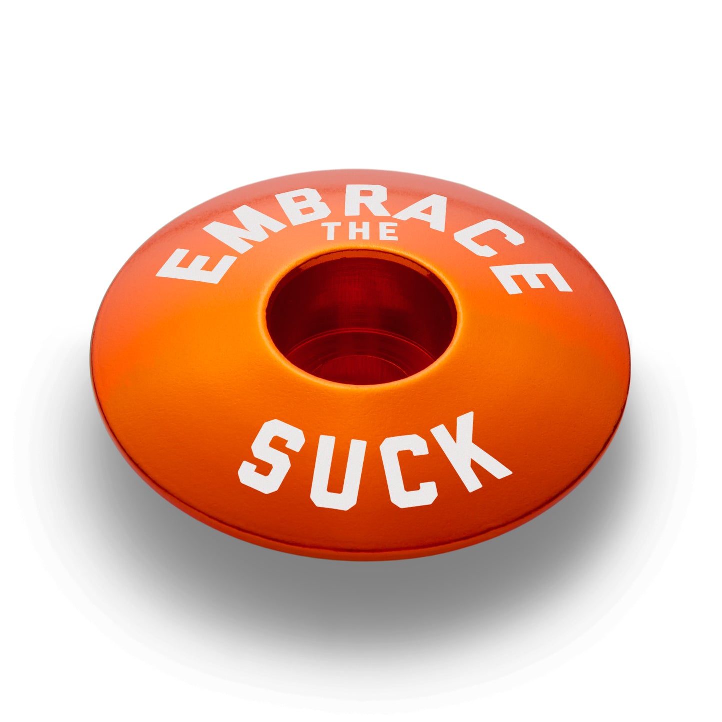 Orange bike headset cap perfect for adding a bold touch to your custom bicycle accessories.