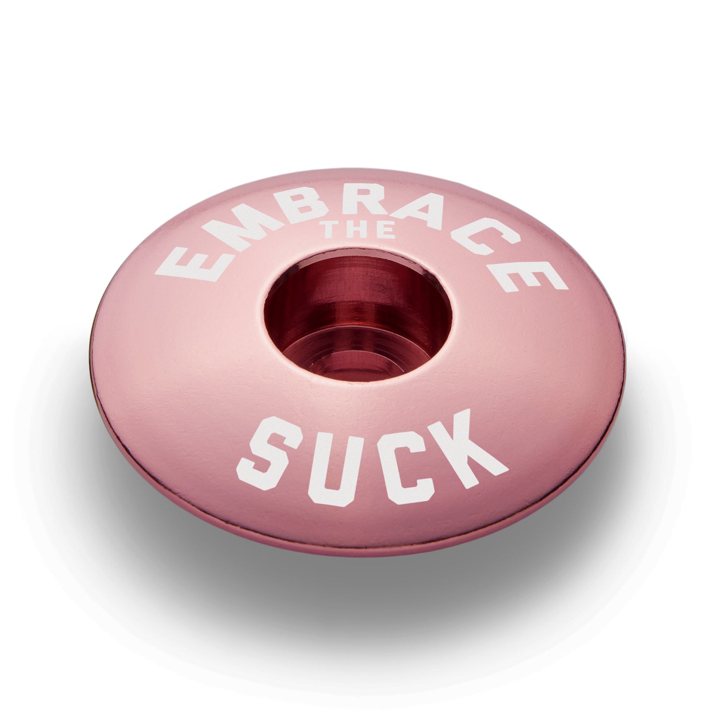 Pink stem top cap designed for cycling setups and bike components that fit 1 1/8" steerer tubes.