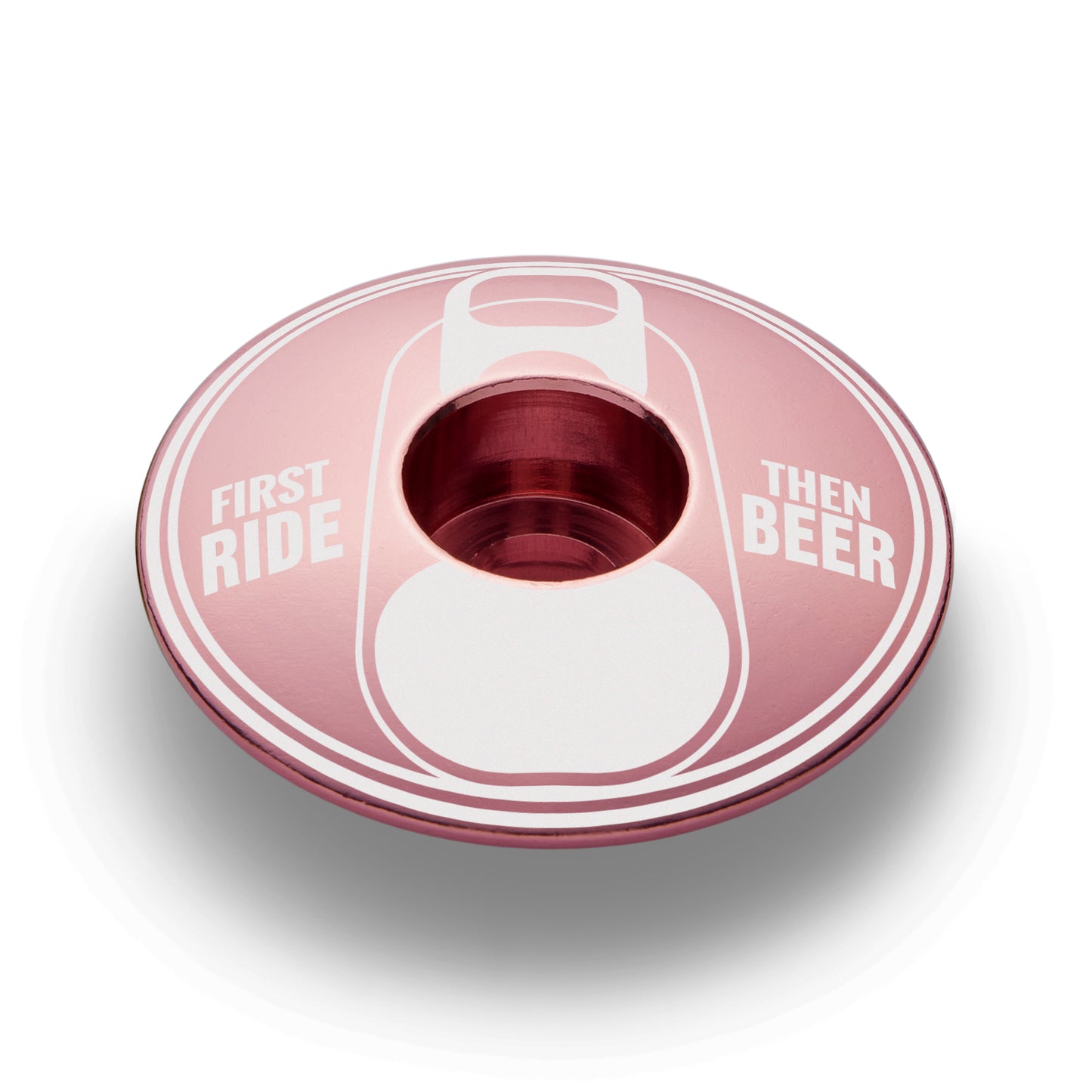 Pink stem top cap with "First Ride Then Beer" design for bike components.