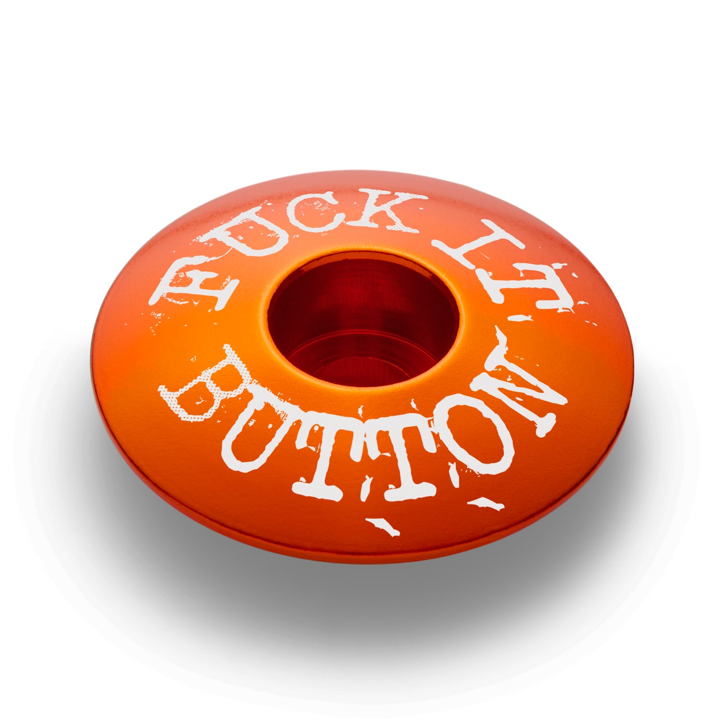 Orange bicycle headset cap adding flair to your bike’s style