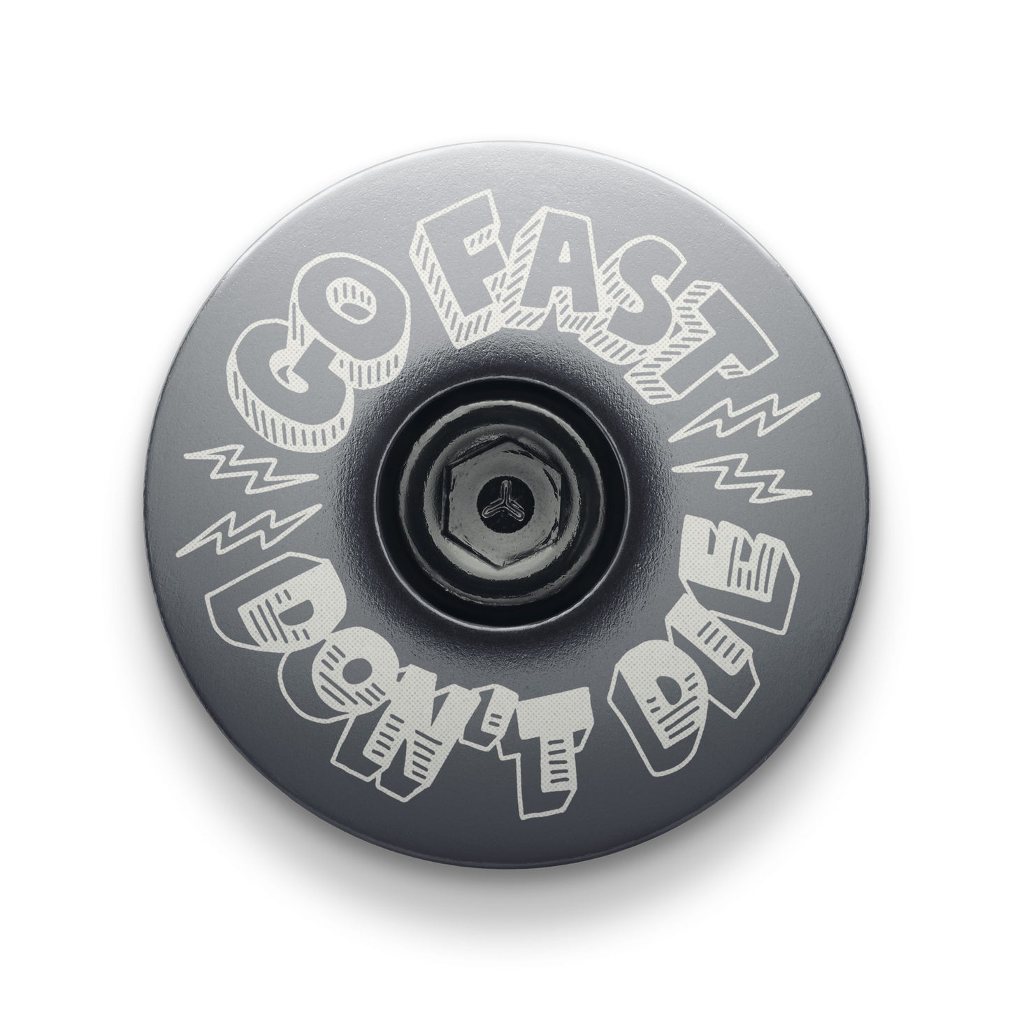 Gray bike headset top cap crafted for strength and style with a Go Fast Don’t Die touch.