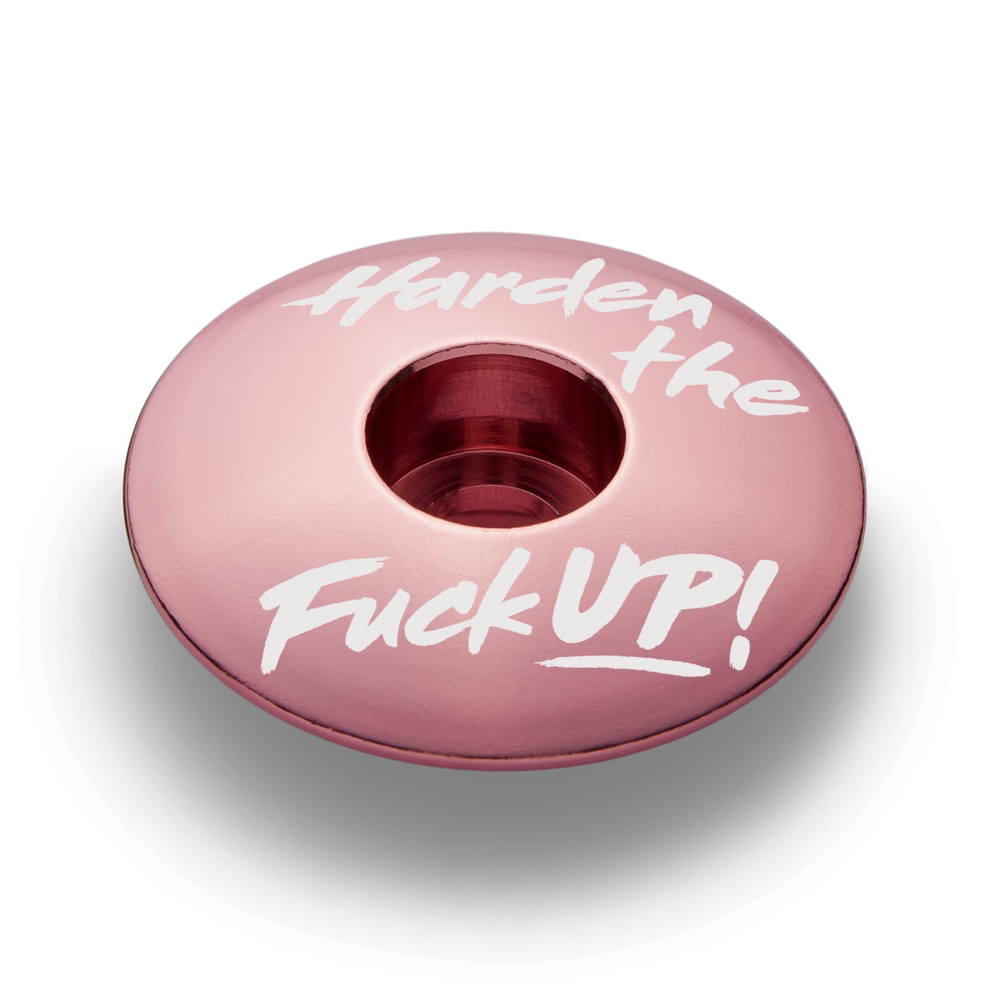 The hot pink personalized bike stem cap fits 1 1/8-inch steerer tubes made from aluminum.