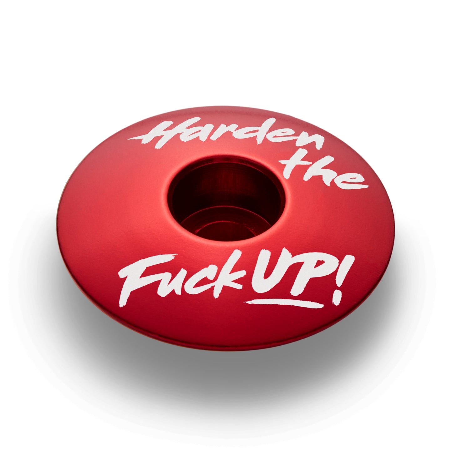 Red bike headset cap made of lightweight aluminum for a 1 1/8-inch steerer tube.