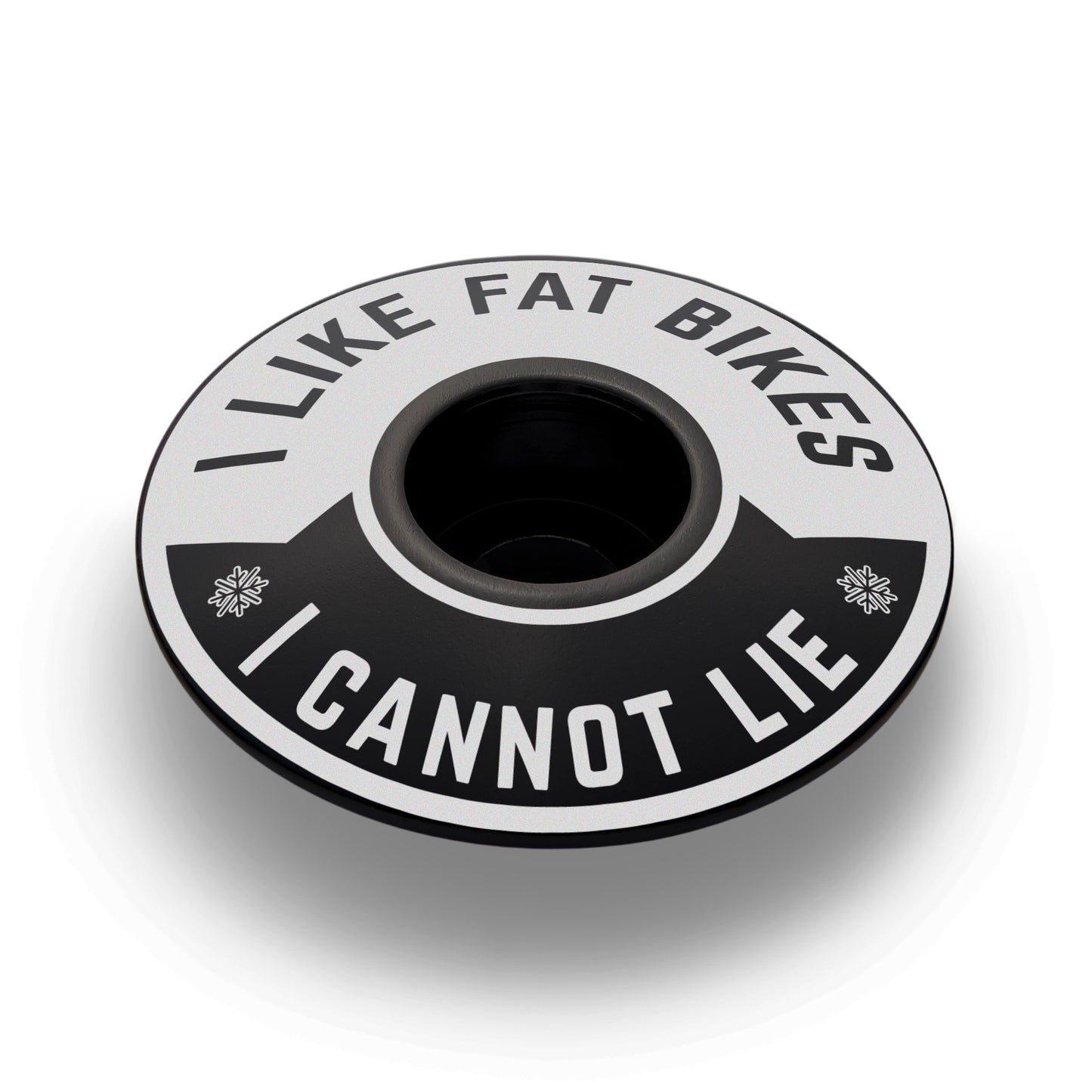 Black bicycle headset cap with "I Like Fat Bikes" design made for 1 1/8" steerer tubes.