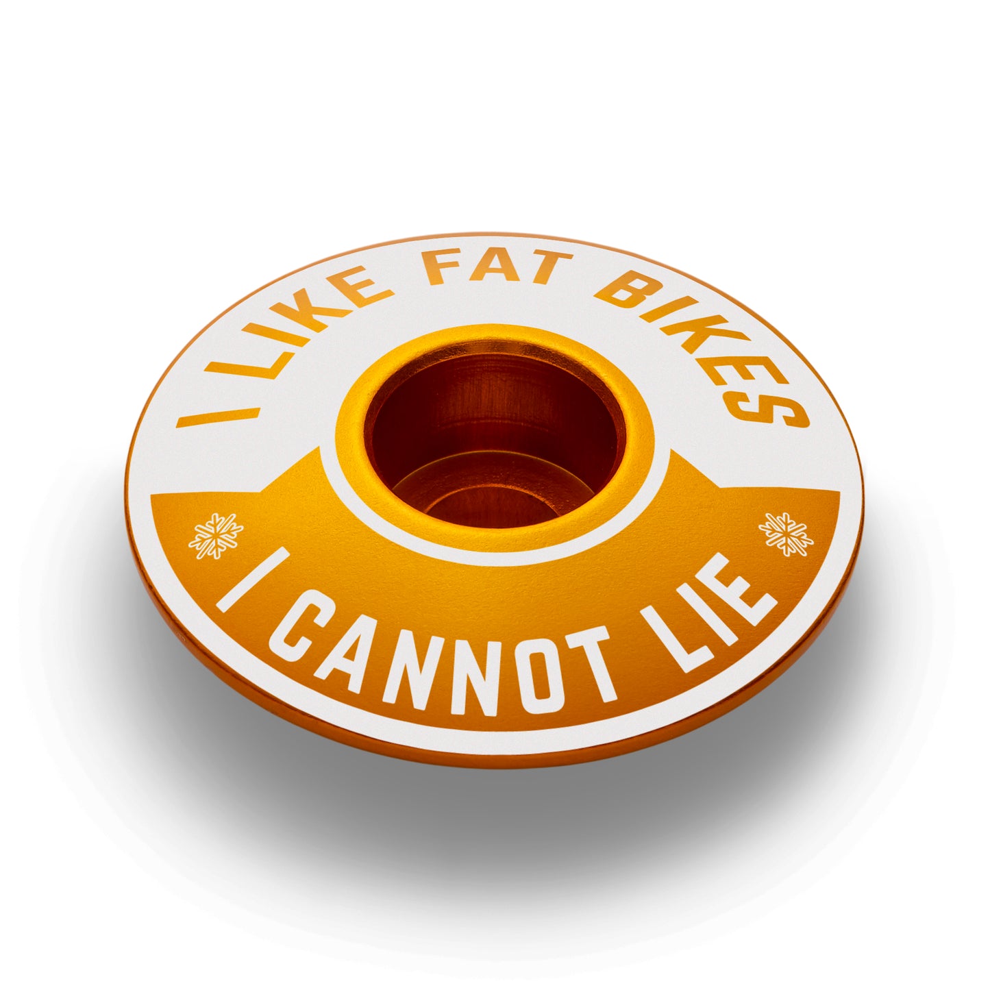 Gold bike headset cap with "I Like Fat Bikes" design perfect for cycling customization.