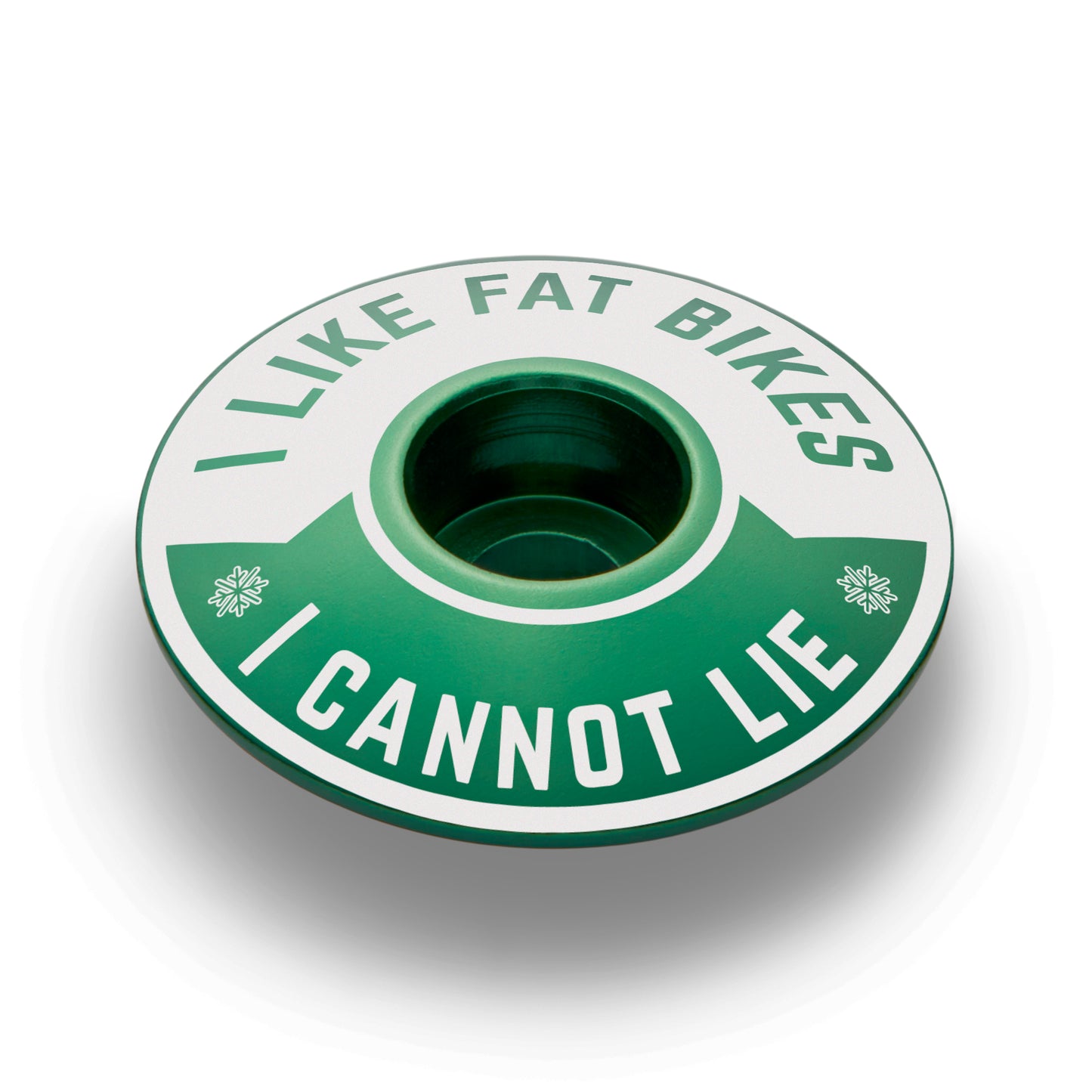 Dark green bike stem cap with "I Like Fat Bikes" design ideal for cycling enthusiasts.