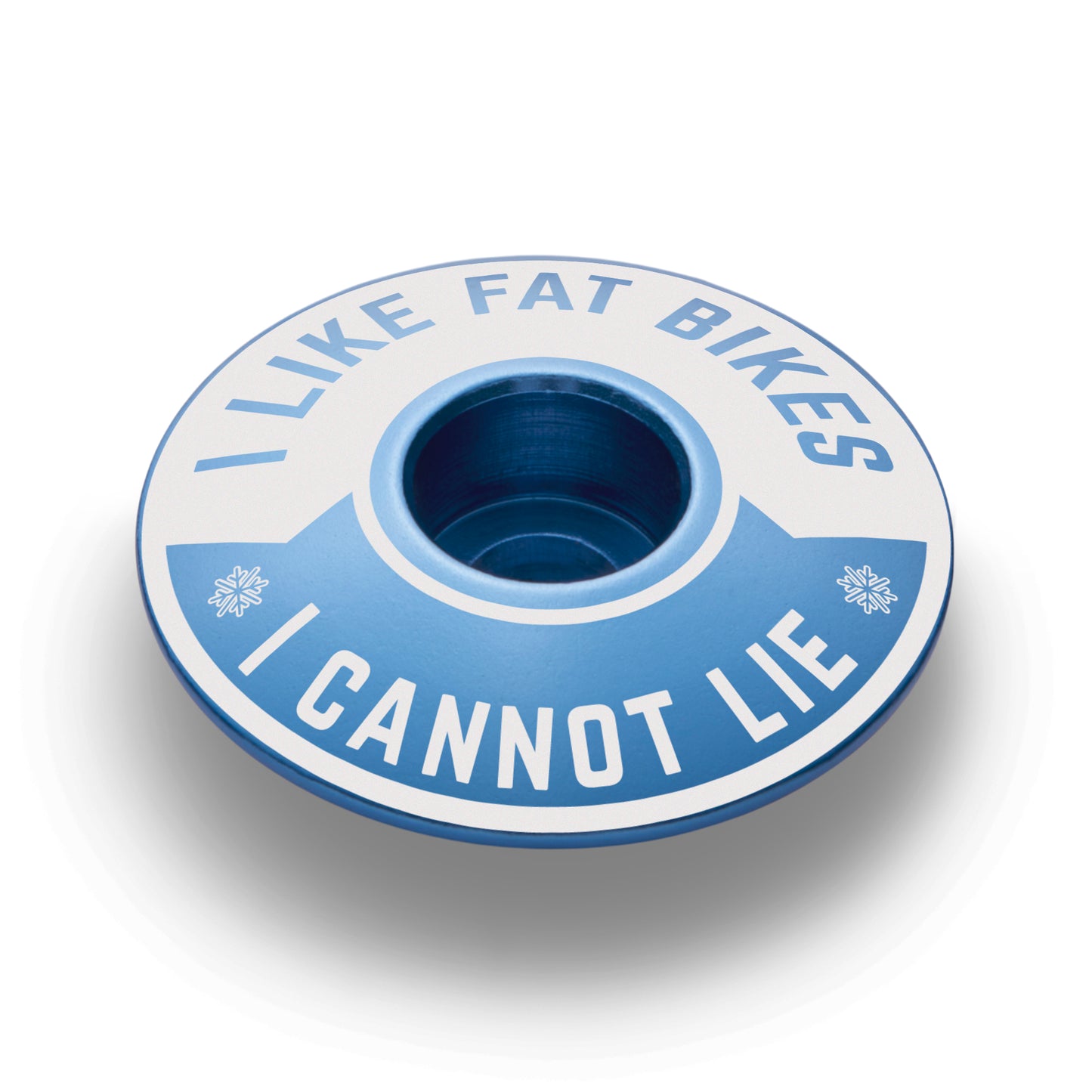 bicycle stem cap with an "I Like Fat Bikes" design crafted from anodized aluminum.