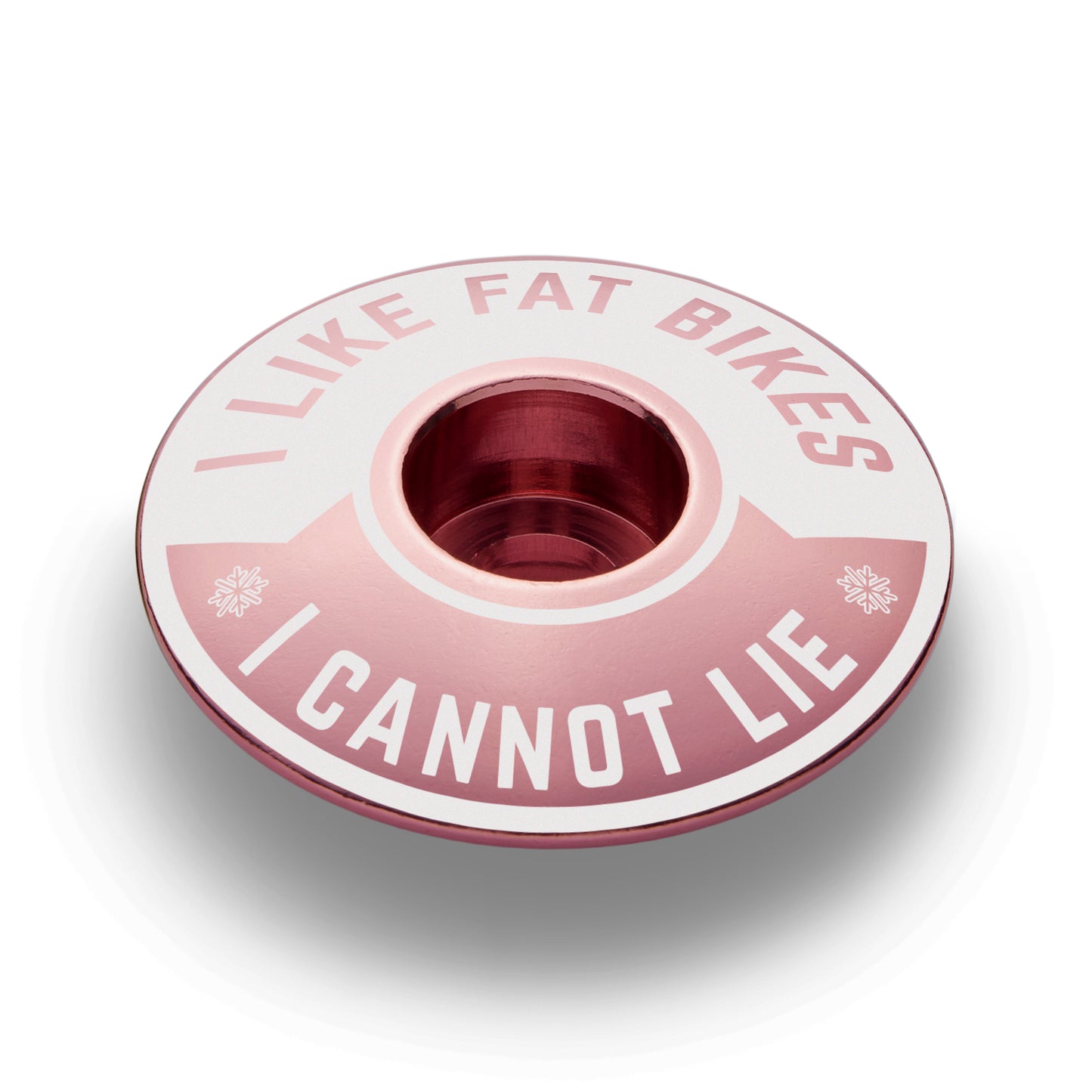 Pink stem top cap with "I Like Fat Bikes" design durable and lightweight for custom bicycles.