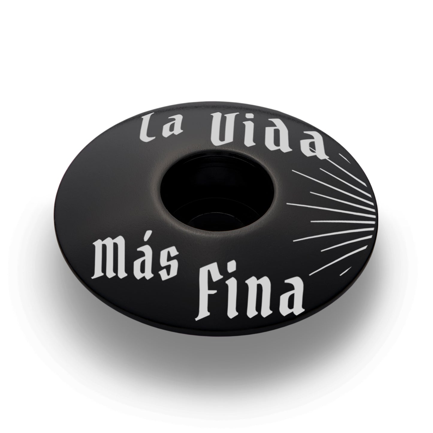 Black bicycle headset cap with a minimalist design for 1 1/8" steerer tubes.