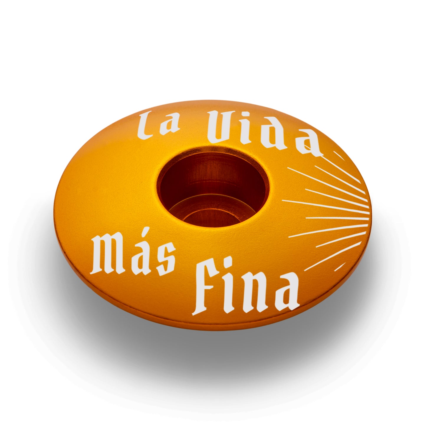Gold top cap designed for premium bike accessories.