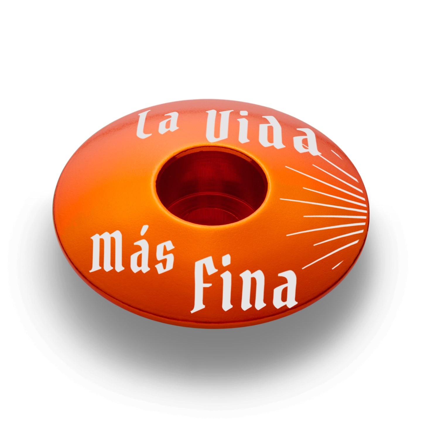 Orange bicycle stem cap for a bold look.