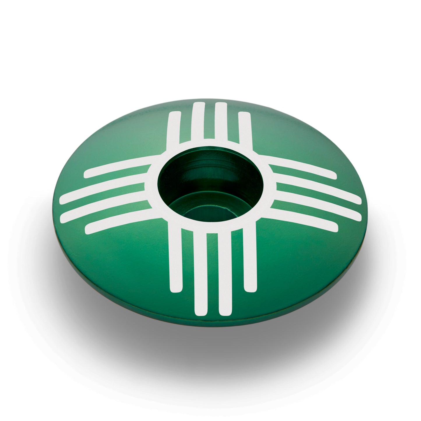 Dark green headset cap with Zia symbol, perfect for customizing your bicycle stem.