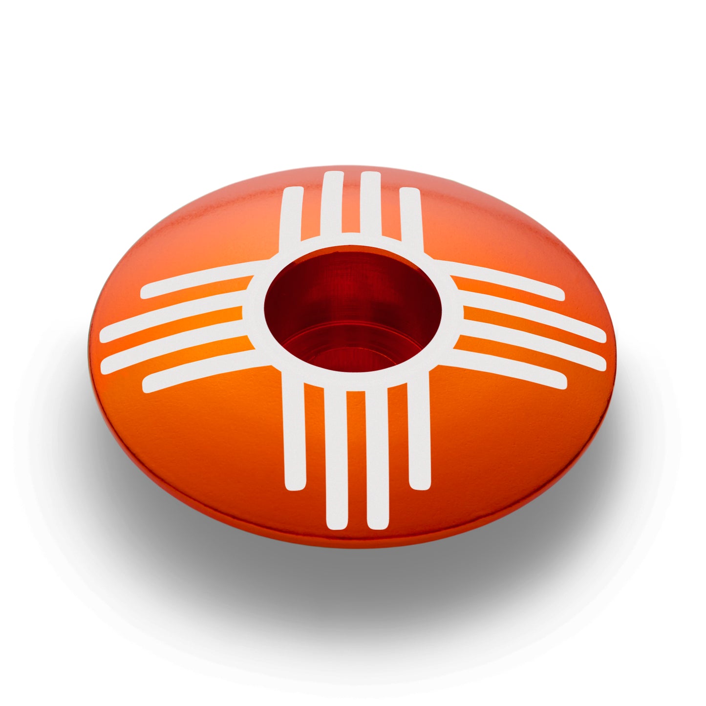 Orange bike headset cap with Zia symbol, ideal for customizing your bike top cap.