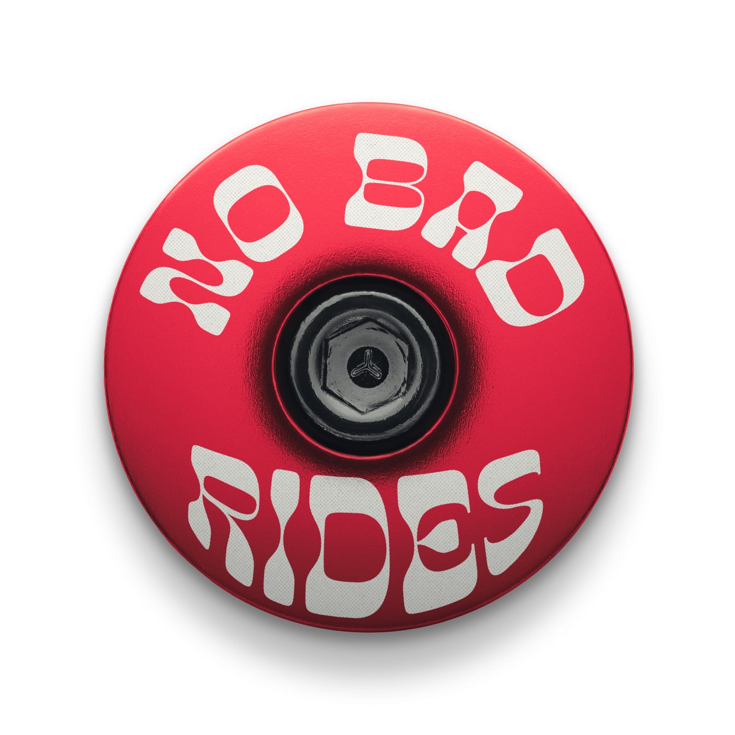 Red bike headset top cap engraved with 'No Bad Rides' message for cyclists.